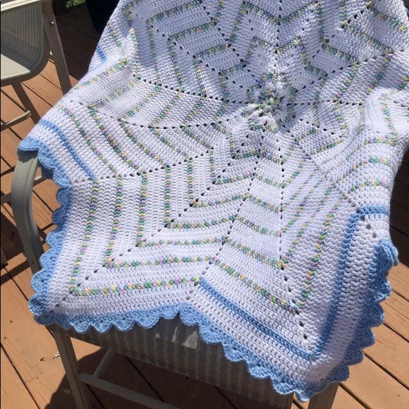Handmade Star Crochet Afghan in the colors: baby mix white and blue.